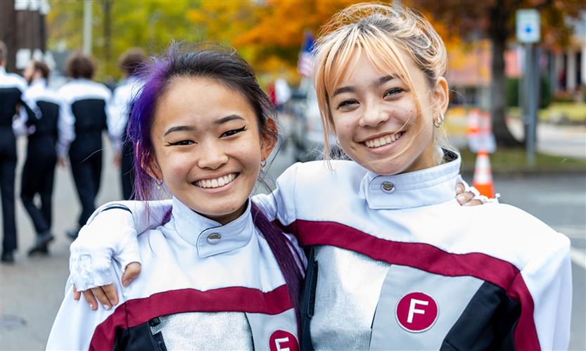 Students march in a Veterans Day Parade